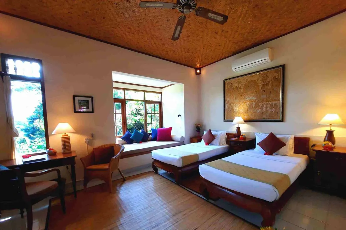 A Deluxe Garden room with twin beds
