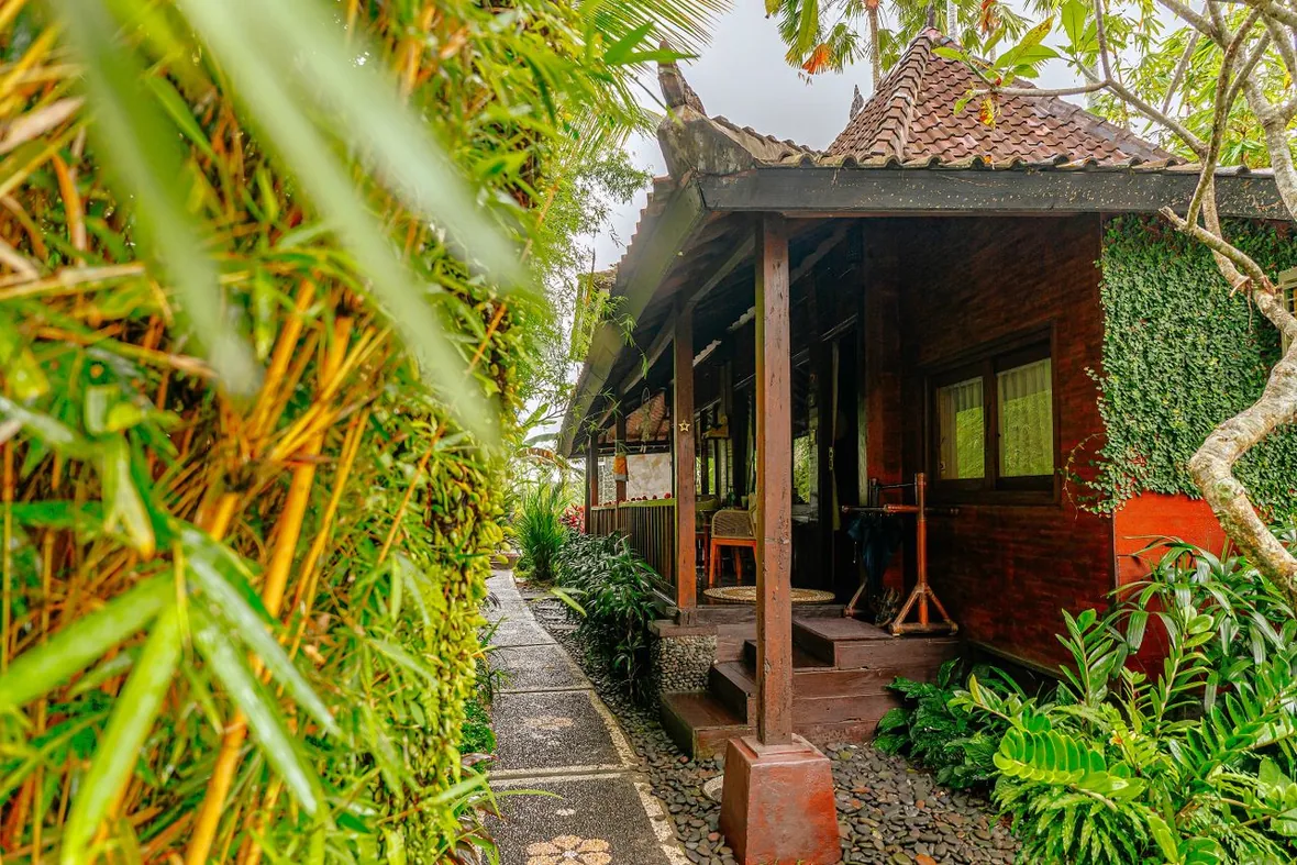 A teak cottage in the garden