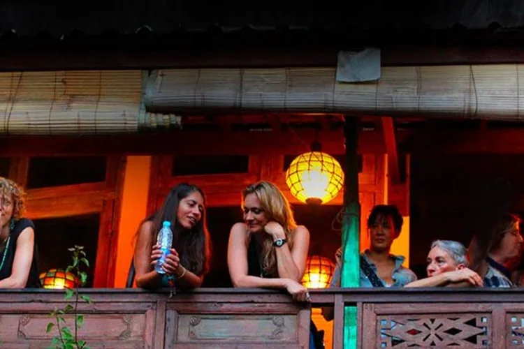 The balcony, lit by lanterns