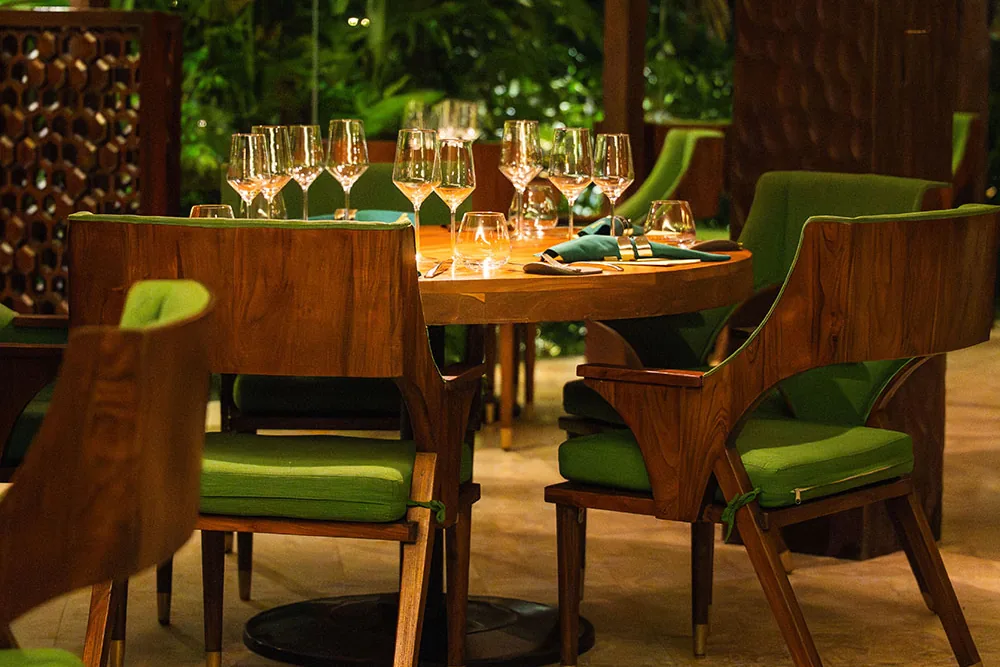 A table set in Mozaic’s dining room, open to the garden