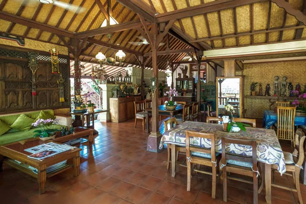 The breakfast area, under a wooden roof