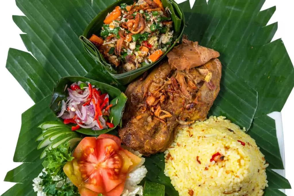 Murni’s Warung bebek betutu on a banana leaf