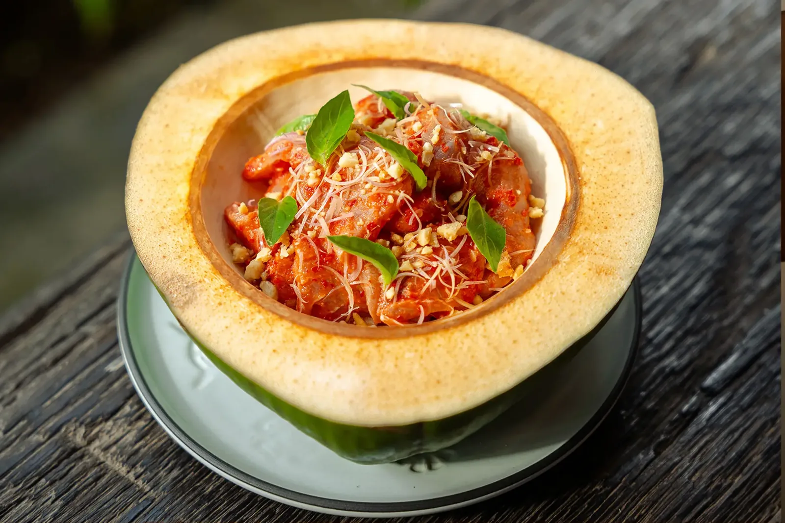 A dish served in half a coconut